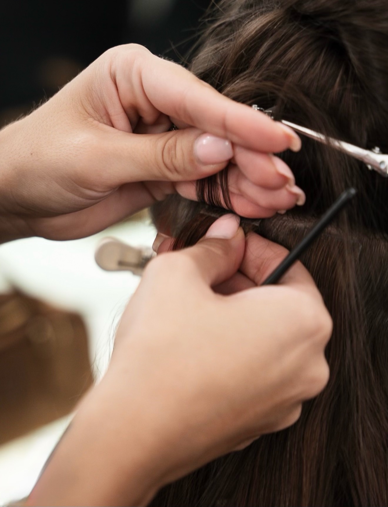 Applicazione extension capelli in salone Didier